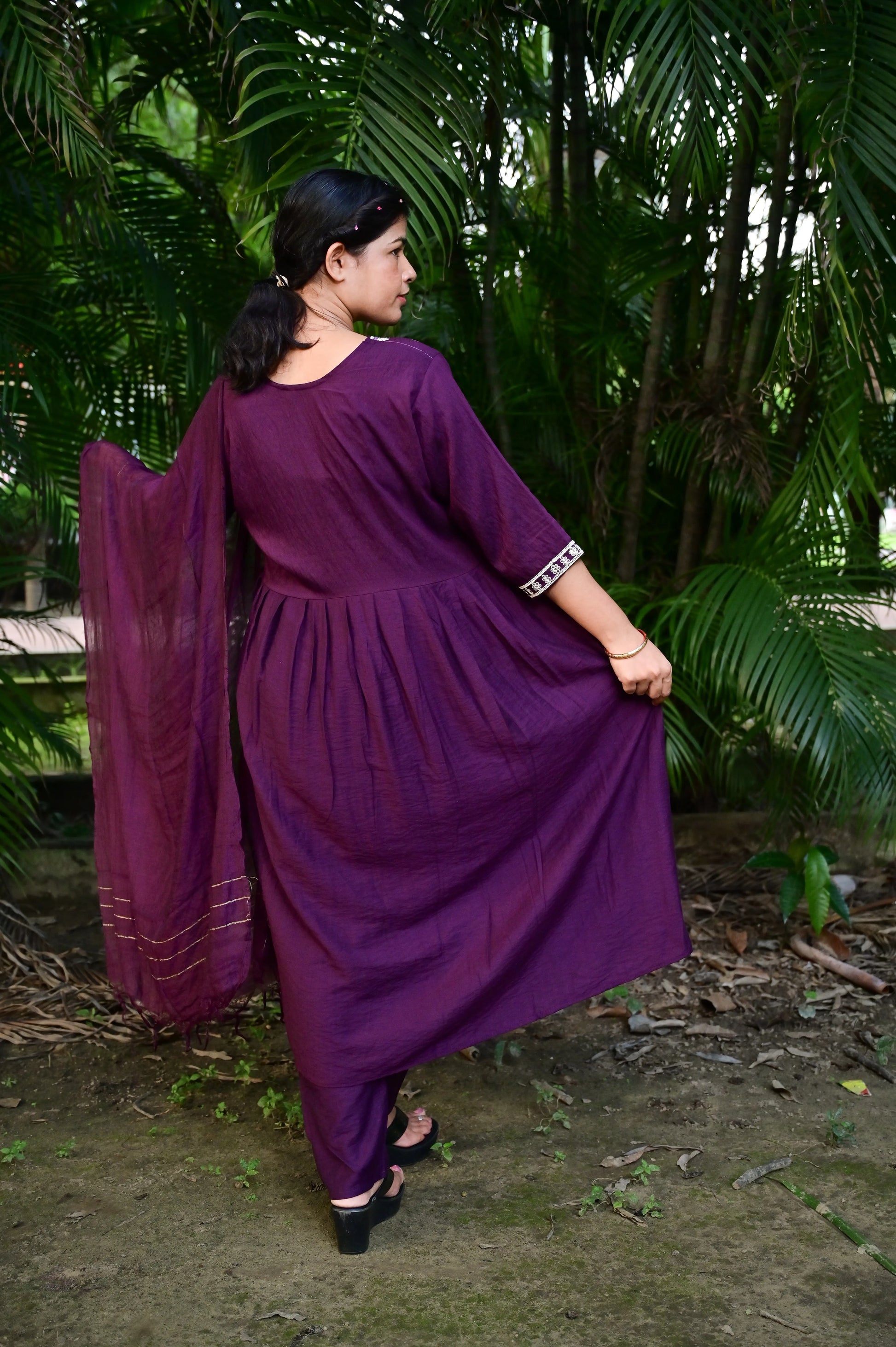 Back view of Deep plum Anarkali kurta set with intricate silver embroidery for women