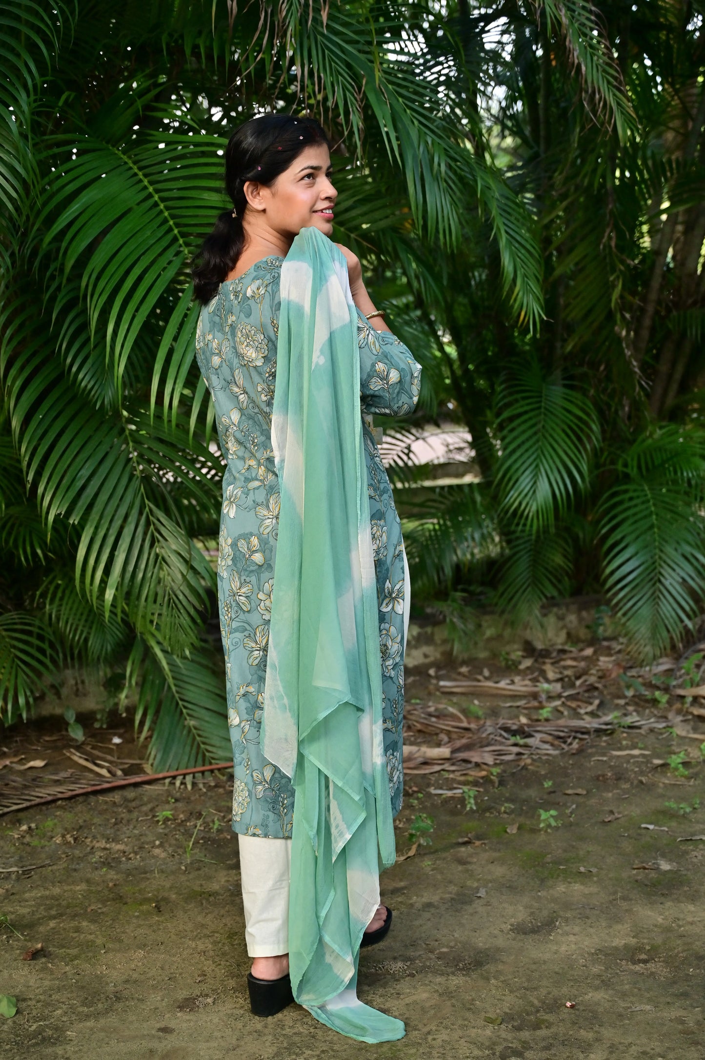 Back view of Sea green cotton flex kurta set with floral print for festive occasions