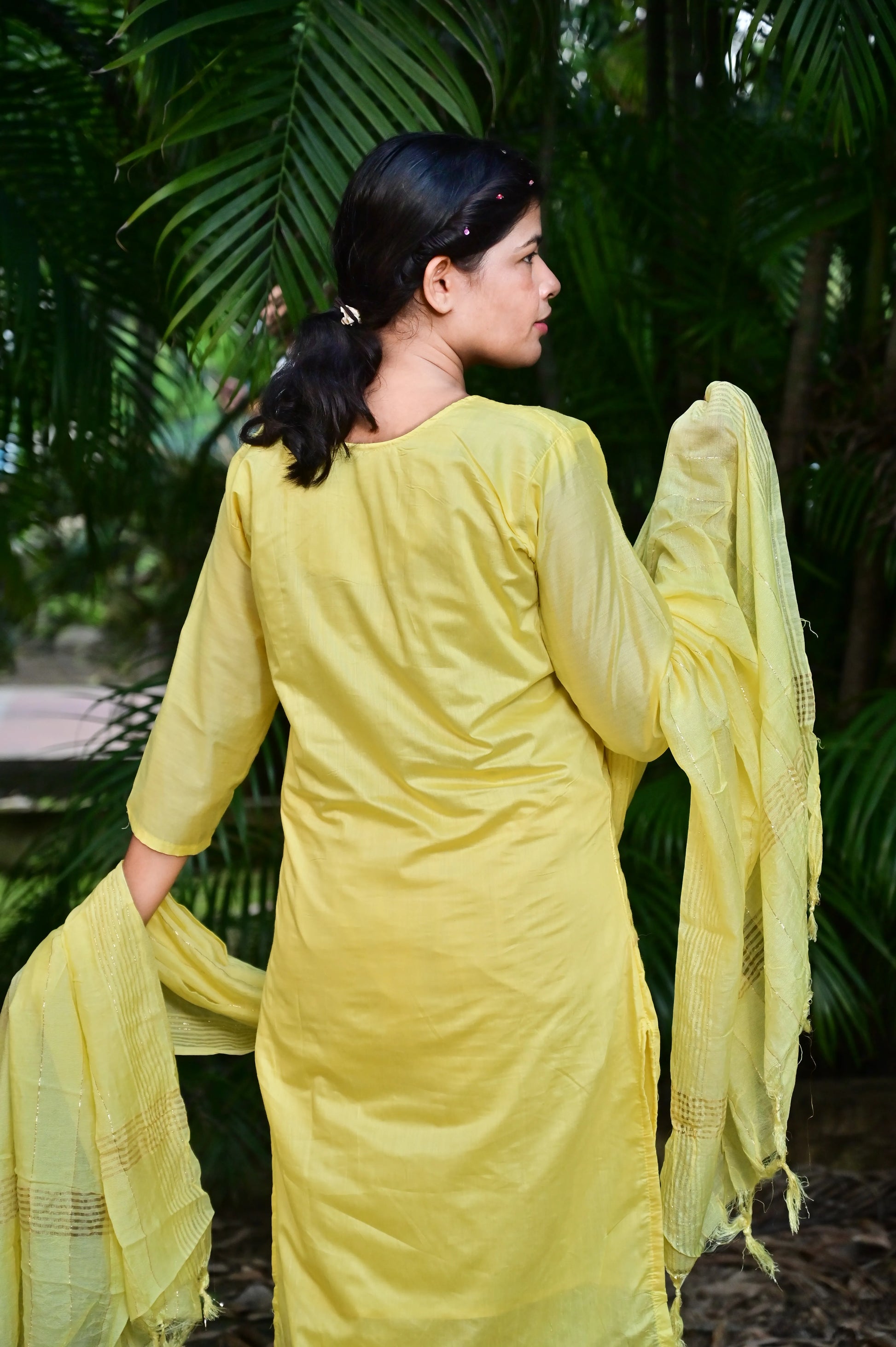 Back view of yellow Chanderi kurta set with lightweight fabric