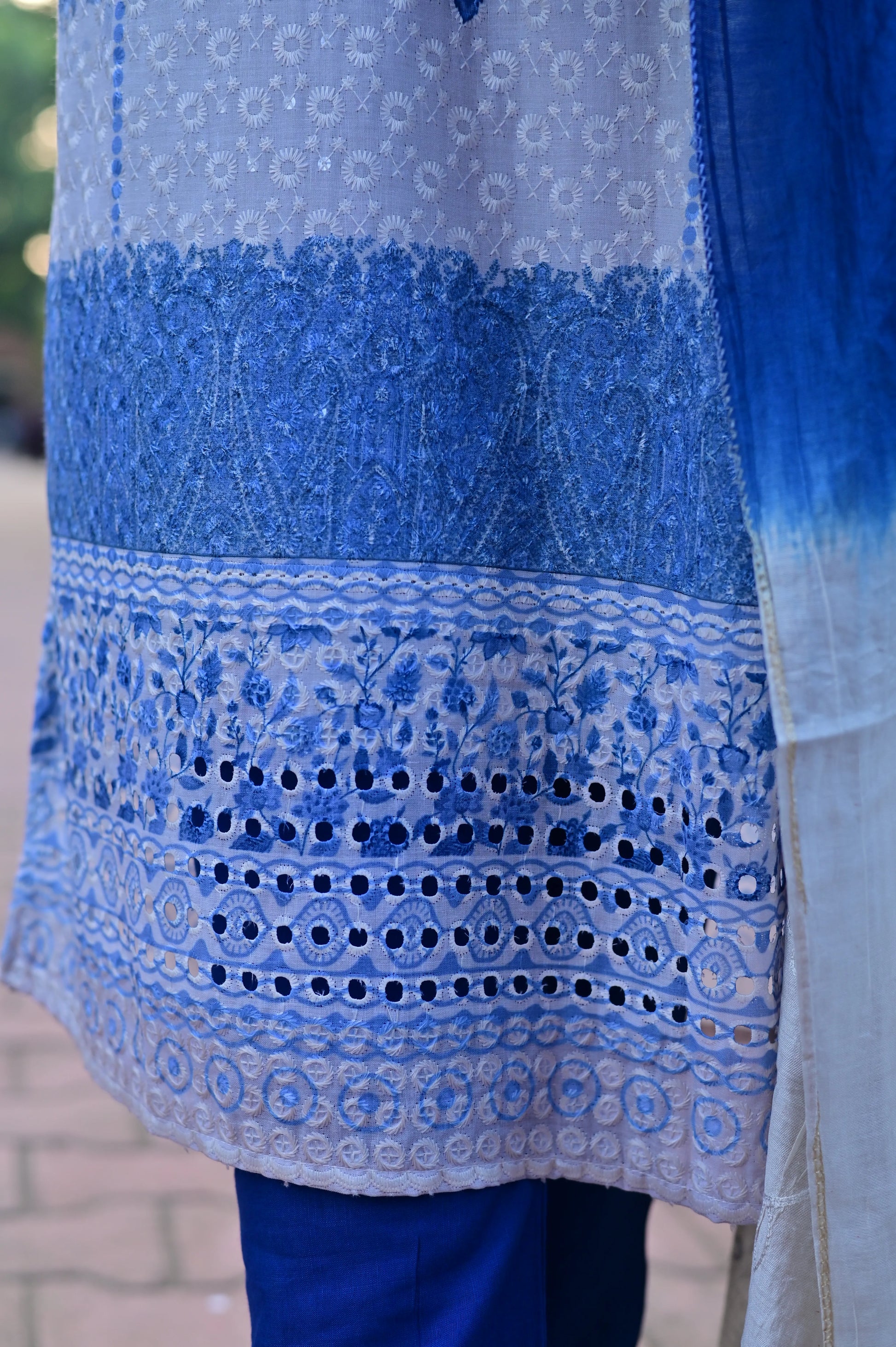 Close-up of blue chikankari floral embroidery on kurta