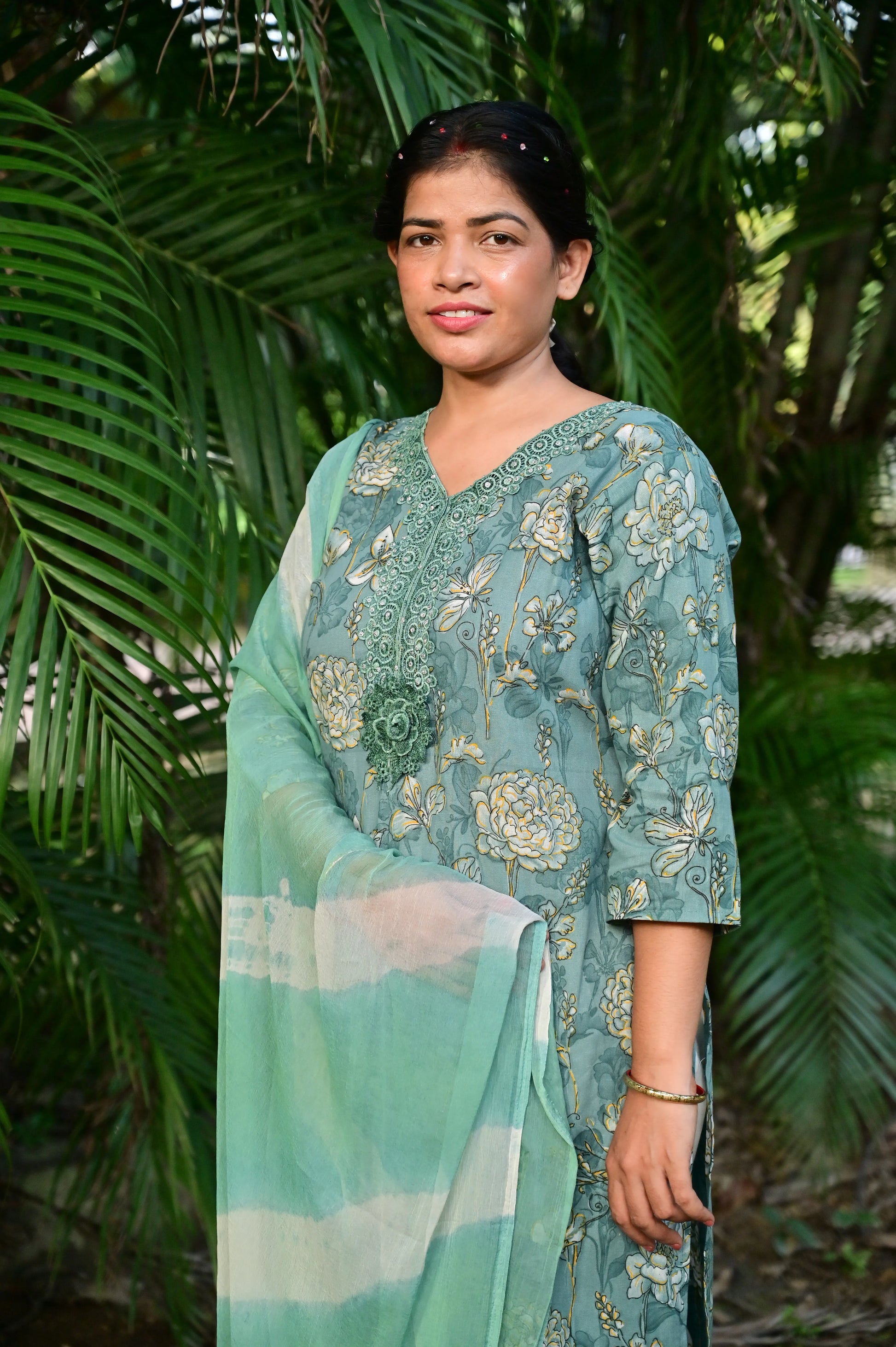 Close-up of embroidery on sea green cotton flex kurta with tie-dye dupatta