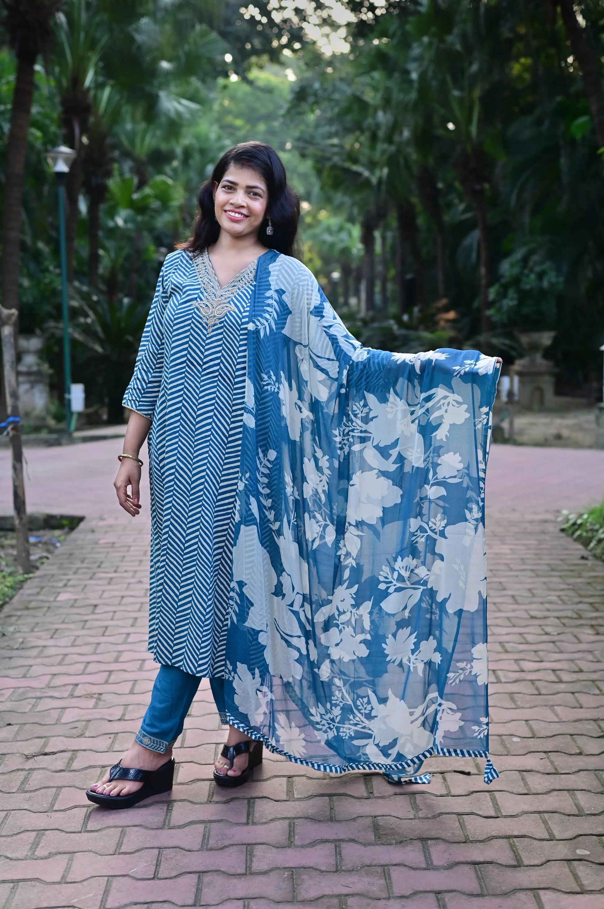 Full view of blue leheriya satin kurta set with lace detailing on pants