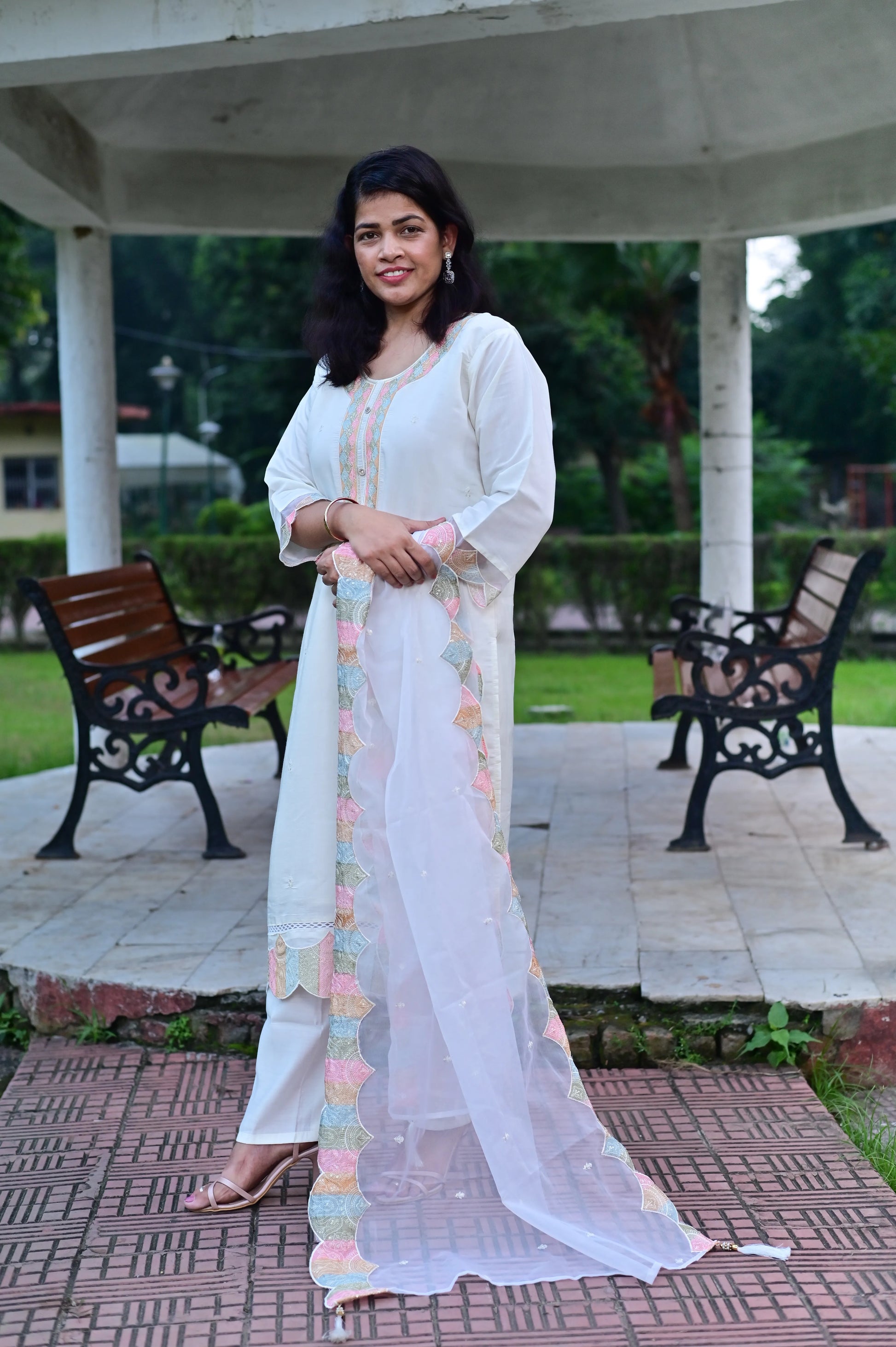 Off white kurta pant set with pastel accents and organza dupatta