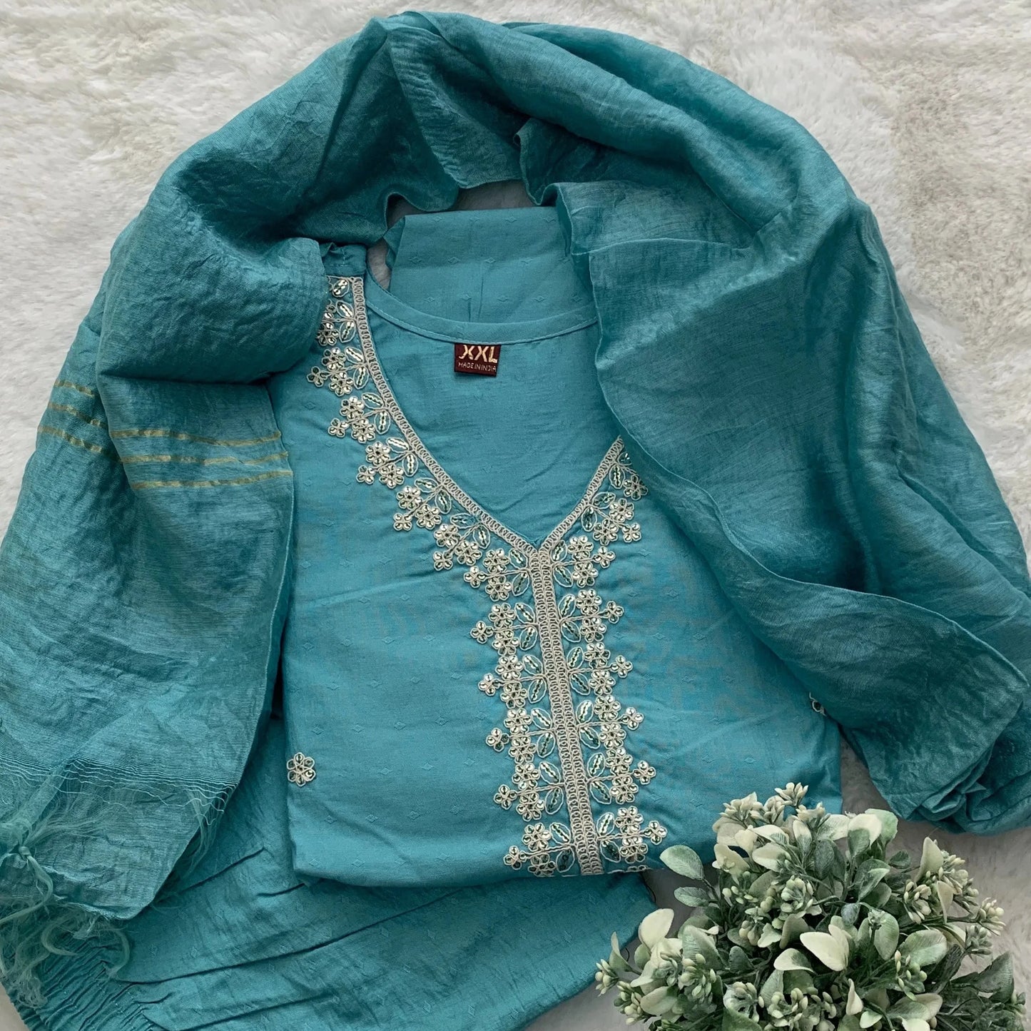 Teal blue Anarkali kurta set with matching dupatta and embroidery