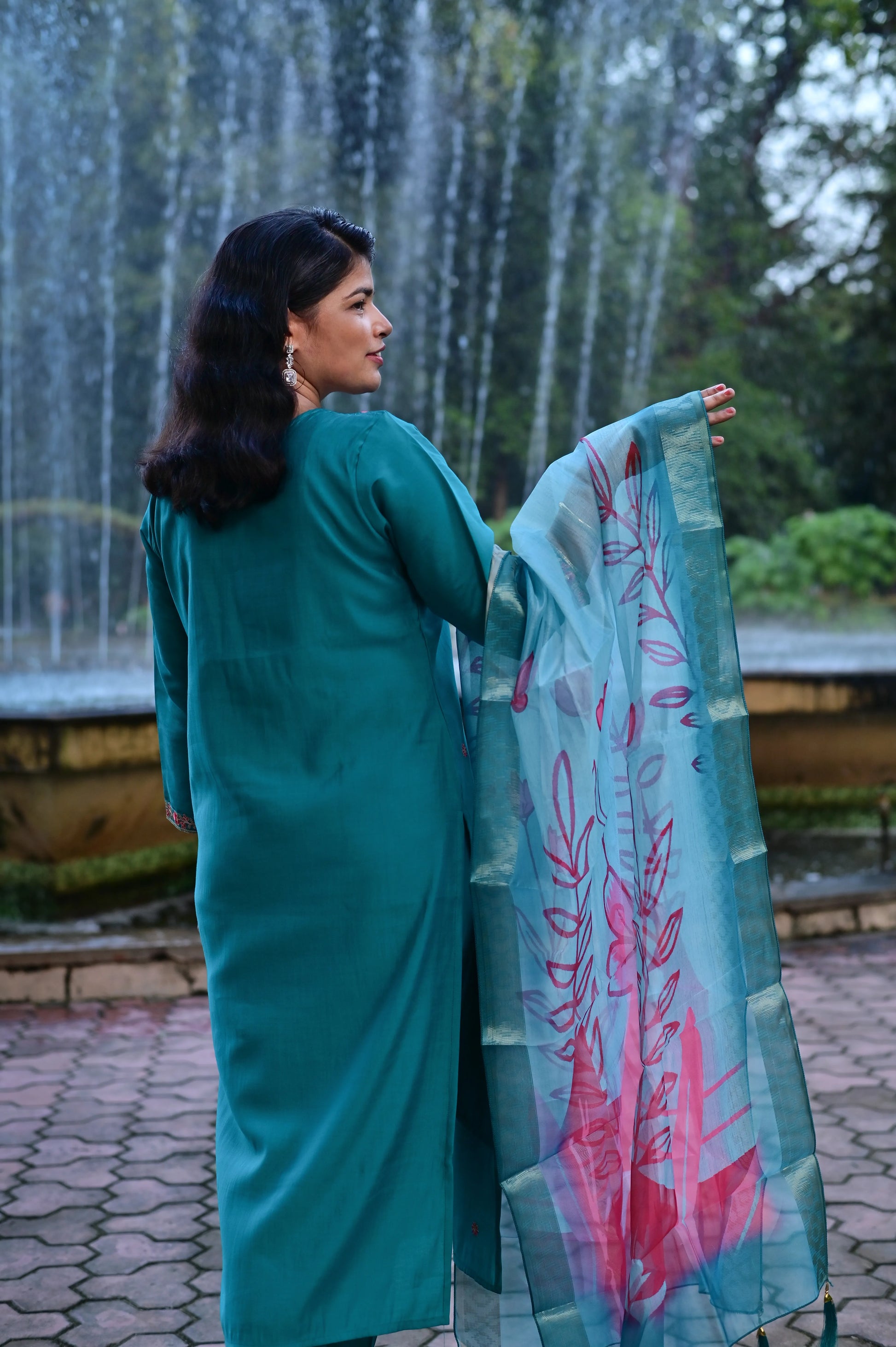 Teal green roman silk 3-piece suit with floral embroidered neckline and printed dupatta back