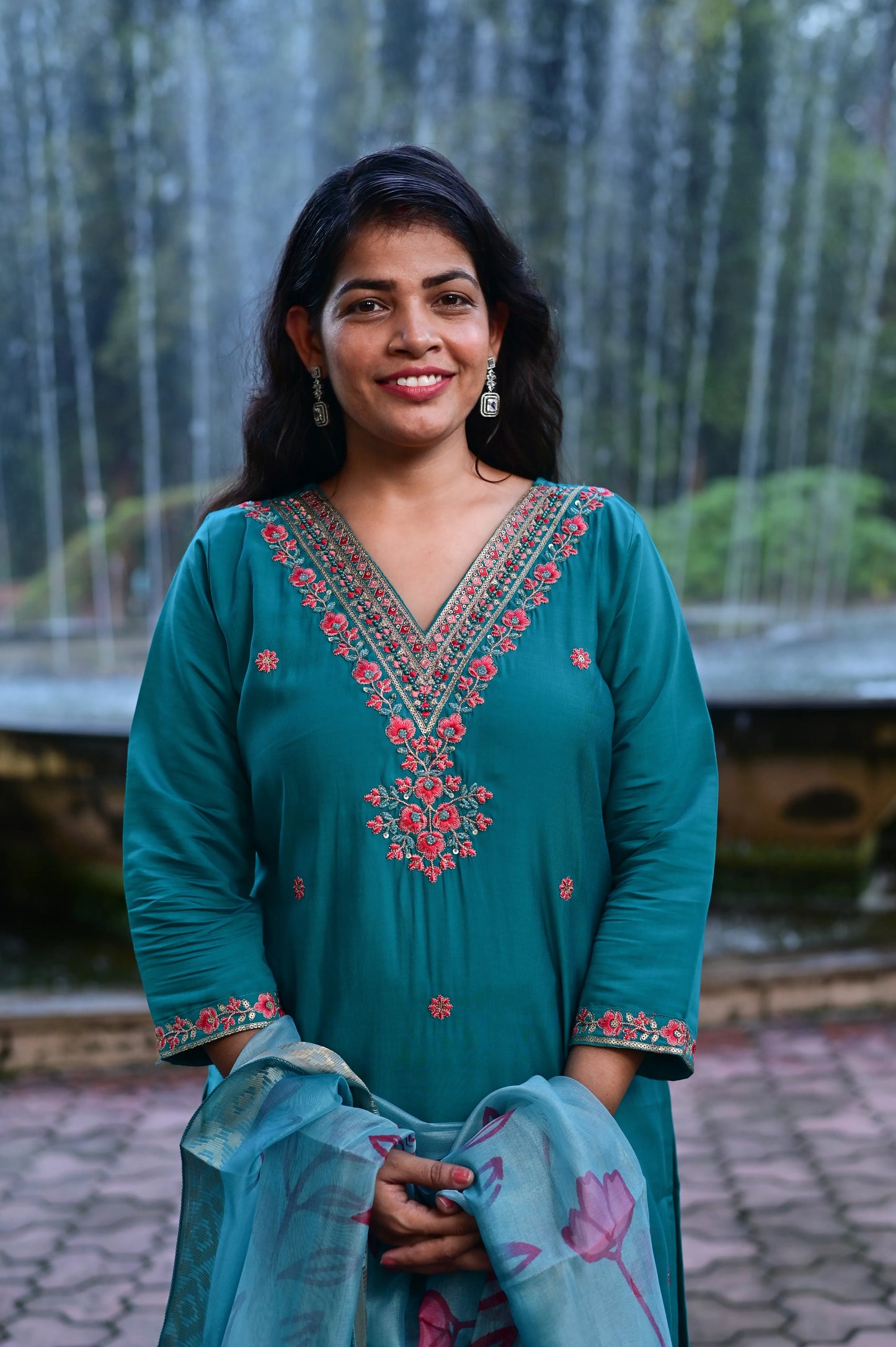 Teal green roman silk 3-piece suit with floral embroidered neckline and printed dupatta half picture