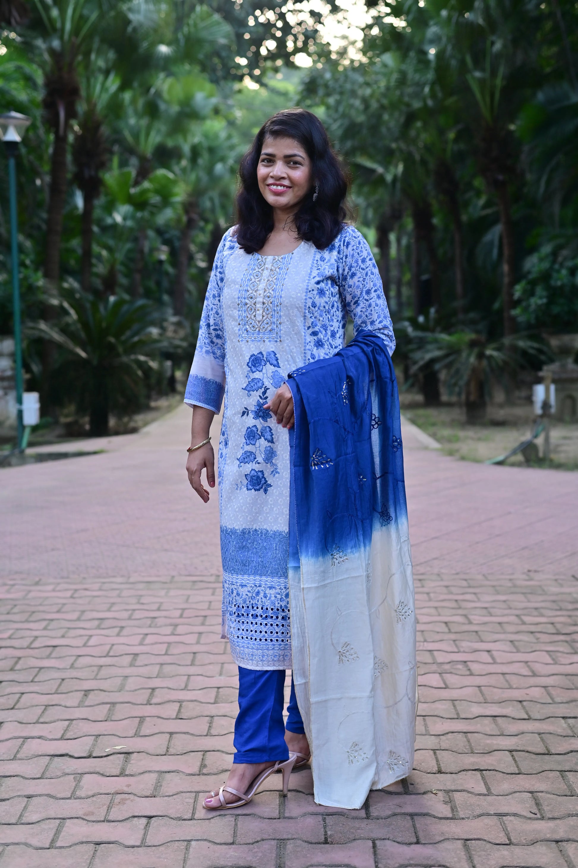 Women's blue floral chikankari kurta pant set with ombre dupatta for festive wear